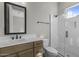 Contemporary bathroom with glass shower, modern vanity and fixtures at 32541 N 135Th Dr, Peoria, AZ 85383