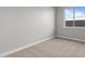 Neutral bedroom with carpeted floor and window offering ample natural light at 32541 N 135Th Dr, Peoria, AZ 85383