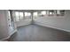 Spacious dining room with tile flooring, large windows, and ample natural light at 32541 N 135Th Dr, Peoria, AZ 85383
