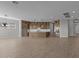 Spacious kitchen featuring custom cabinetry, modern appliances, and large center island at 32541 N 135Th Dr, Peoria, AZ 85383