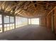 Spacious view of a new construction interior with exposed framing at 32637 N Newby Dr, San Tan Valley, AZ 85143