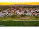 Community aerial view of the golf course, showcasing homes surrounded by lush greenery at 3665 S Jojoba Way, Chandler, AZ 85248