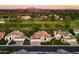 Expansive aerial view showcasing beautiful homes adjacent to the well-manicured golf course at 3665 S Jojoba Way, Chandler, AZ 85248