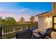 Balcony with outdoor seating overlooking a pool and golf course at 3665 S Jojoba Way, Chandler, AZ 85248