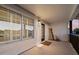 Spacious covered porch with seating and exterior access at 3665 S Jojoba Way, Chandler, AZ 85248
