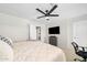 Bedroom with tv and adjacent bathroom at 3665 S Jojoba Way, Chandler, AZ 85248