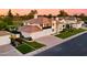 Beautiful home with a private balcony, three-car garage, and well-maintained lawn at 3665 S Jojoba Way, Chandler, AZ 85248