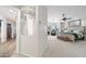 Stylish bedroom entrance leads to a serene bedroom with a sitting area and bay windows at 3665 S Jojoba Way, Chandler, AZ 85248