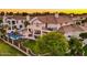 Elegant two-story home featuring a patio, pool, manicured lawn, perfect for relaxation at 3665 S Jojoba Way, Chandler, AZ 85248
