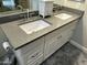 Bathroom featuring a double sink vanity with granite countertop and tiled floor at 3677 E Park Ave, Gilbert, AZ 85234