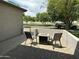 Outdoor patio featuring a table, chairs, and view of the surrounding neighborhood at 3677 E Park Ave, Gilbert, AZ 85234
