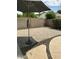 Paver patio with block wall and umbrella at 3677 E Park Ave, Gilbert, AZ 85234