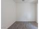 Empty room featuring tile flooring and base trim at 39980 W Bunker Dr, Maricopa, AZ 85138