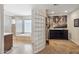 Spacious bathroom with dual sinks, glass block shower and accent wall, and a luxurious soaking tub at 401 E Braeburn Dr, Phoenix, AZ 85022