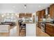 Stylish kitchen with island seating and ample cabinet space at 401 E Braeburn Dr, Phoenix, AZ 85022
