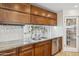 Well-equipped kitchen with stainless steel appliances and granite countertops at 401 E Braeburn Dr, Phoenix, AZ 85022