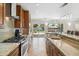 Modern kitchen with granite countertops and stainless steel appliances at 401 E Braeburn Dr, Phoenix, AZ 85022