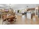 Spacious living room featuring a stone fireplace and modern lighting fixtures at 401 E Braeburn Dr, Phoenix, AZ 85022