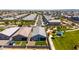 Aerial view highlighting backyard, community park, and street at 4114 S 106Th Dr, Tolleson, AZ 85353