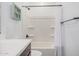 Clean bathroom with a shower featuring a white shower curtain at 4114 S 106Th Dr, Tolleson, AZ 85353