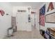 Bright bedroom featuring closet with sliding doors and decorative flags at 4114 S 106Th Dr, Tolleson, AZ 85353