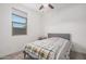Cozy bedroom with natural light and neutral-toned furnishings at 4114 S 106Th Dr, Tolleson, AZ 85353