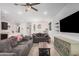 Spacious living area with view of modern interior design and TV area at 4114 S 106Th Dr, Tolleson, AZ 85353