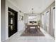 Cozy dining area with a chandelier, windows and hardwood floors at 4306 E Raven Rd, Phoenix, AZ 85044