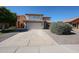 Charming two-story home with a well-maintained front yard and a spacious two-car garage at 4306 E Raven Rd, Phoenix, AZ 85044