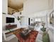 Bright living room with a comfortable seating area, fireplace and hardwood floors at 4306 E Raven Rd, Phoenix, AZ 85044