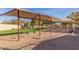 Playground area with swings and climbing structures, providing a fun space for to play at 4306 E Raven Rd, Phoenix, AZ 85044