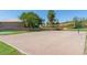 Community sand volleyball court near a grassy area and neighborhood homes offers outdoor activity at 4306 E Raven Rd, Phoenix, AZ 85044