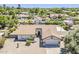Aerial view of a home with a red tile roof, desert landscaping, and a 2 car garage at 625 E Silver Creek Rd, Gilbert, AZ 85296