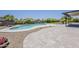 Large backyard featuring a pool, low maintenance landscaping, patio, and pavers at 625 E Silver Creek Rd, Gilbert, AZ 85296