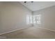 Bright bedroom featuring high ceilings, a neutral color palette, and ample natural light at 625 E Silver Creek Rd, Gilbert, AZ 85296