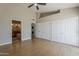 Spacious bedroom with an ensuite bathroom, closets, and flooring at 625 E Silver Creek Rd, Gilbert, AZ 85296