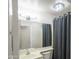Bathroom featuring a large mirror and a vanity with good lighting at 6388 W Donald Dr, Glendale, AZ 85310