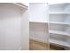 Walk in closet featuring built in shelving at 6388 W Donald Dr, Glendale, AZ 85310