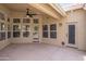 Enjoy a covered patio with abundant natural light flowing through numerous windows and direct access to the pool area at 6388 W Donald Dr, Glendale, AZ 85310