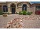 Well-kept desert landscaping surrounds the property, adding curb appeal at 6388 W Donald Dr, Glendale, AZ 85310