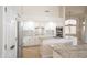 Open kitchen with granite countertops, stainless steel appliances, and a kitchen island with a sink at 6388 W Donald Dr, Glendale, AZ 85310