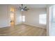 Bright main bedroom with views to an ensuite bathroom and plenty of natural light at 6388 W Donald Dr, Glendale, AZ 85310