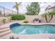Sparkling pool with a convenient built-in grill area, perfect for outdoor cooking and entertaining at 6388 W Donald Dr, Glendale, AZ 85310