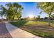 Scenic view of the park with a walking path and lush trees create a peaceful retreat at 712 W Jade Dr, Chandler, AZ 85248