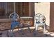 Relaxing patio area with stylish chairs and table, ideal for outdoor lounging near the home at 712 W Jade Dr, Chandler, AZ 85248