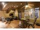 Covered outdoor patio with ceiling fans, stylish furniture, and tile flooring, perfect for relaxing evenings at 712 W Jade Dr, Chandler, AZ 85248