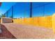 Spacious backyard featuring gravel landscaping, a wooden fence, and a small storage shed at 7442 E Baseline Rd, Mesa, AZ 85209