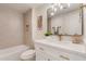 Stylish bathroom features a shower-tub combo, sleek vanity with quartz countertop, and contemporary fixtures at 7442 E Baseline Rd, Mesa, AZ 85209