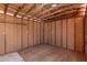 Shed with a sturdy wood frame and plywood walls, offering great potential for storage and customization at 7442 E Baseline Rd, Mesa, AZ 85209