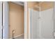 Clean bathroom featuring a glass-enclosed shower and functional fixtures at 8952 W Monte Vista Rd, Phoenix, AZ 85037